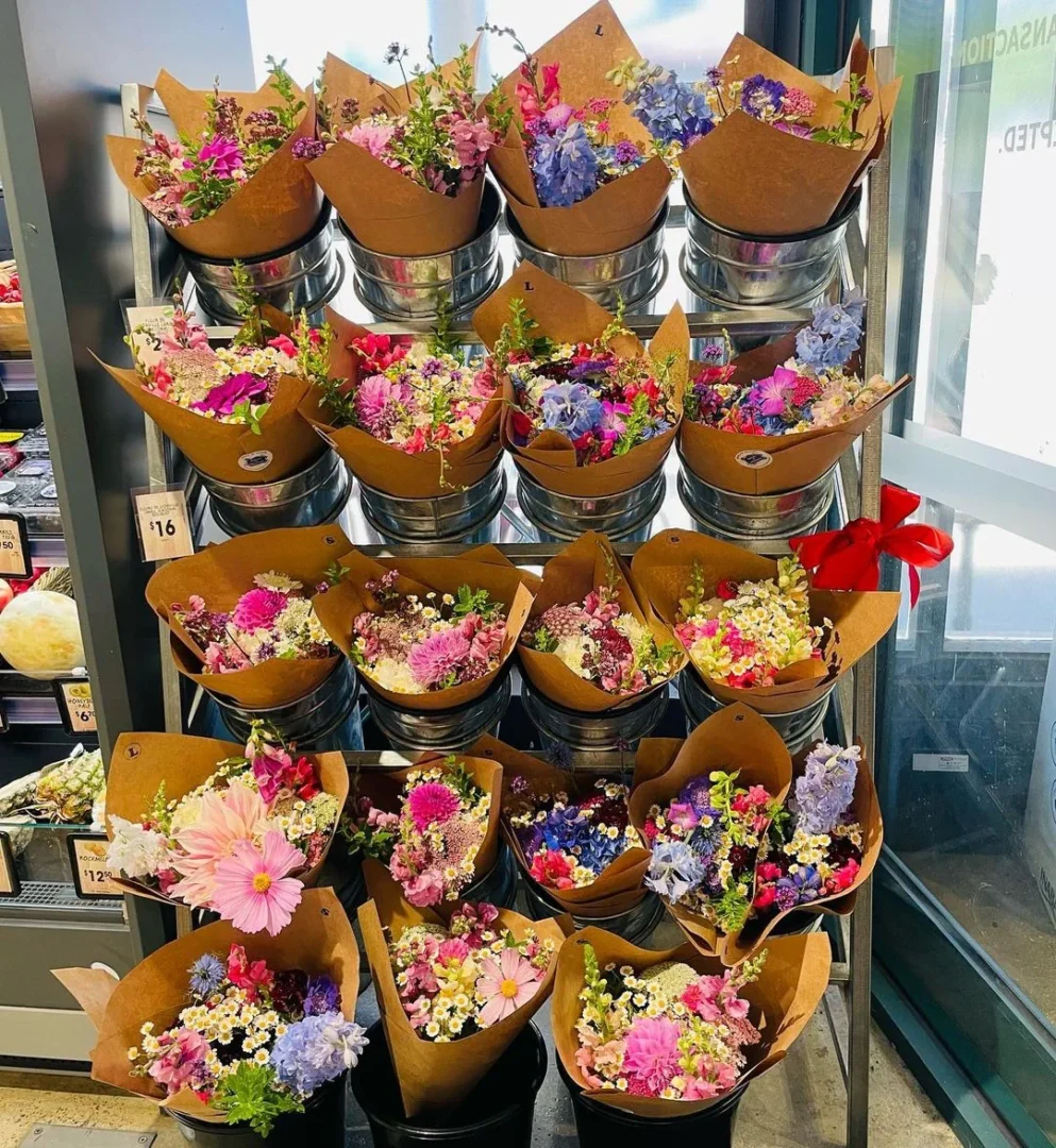 Stockists Stacks Of Flower Bouquets In Metal Pails